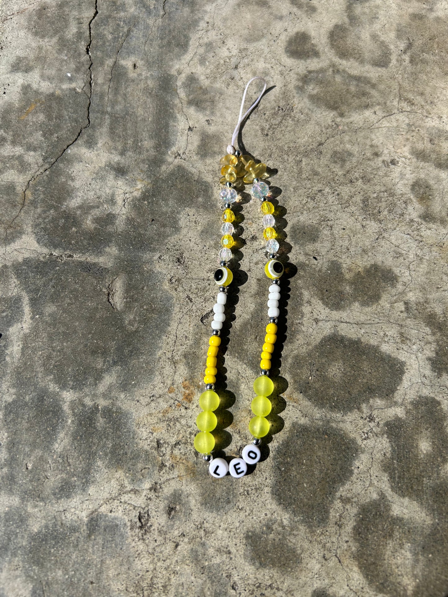 Leo Yellow Phone Charm